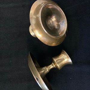 Brass candle sticks. Two antique brass candle sticks.
